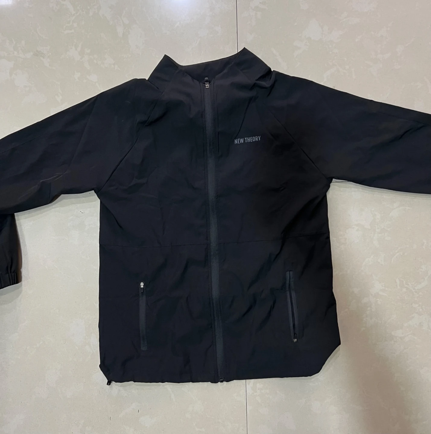 Shop Impact Woven Track Top - Black | New Theory Clothing