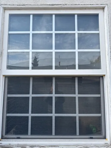 Reflective residential window