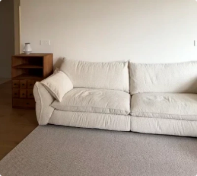 Customer photo of a refreshed white sofa