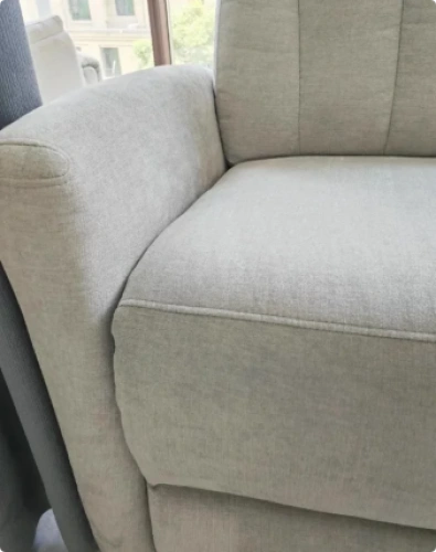 Customer close-up photo of a clean upholstered chair