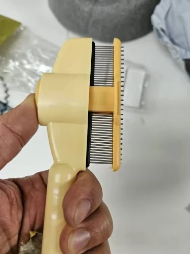 Long-haired cat being brushed