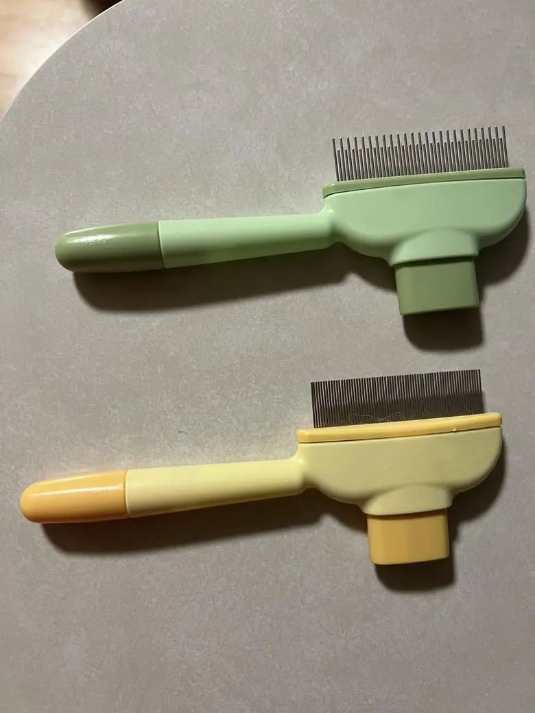 Hand holding brush with fur